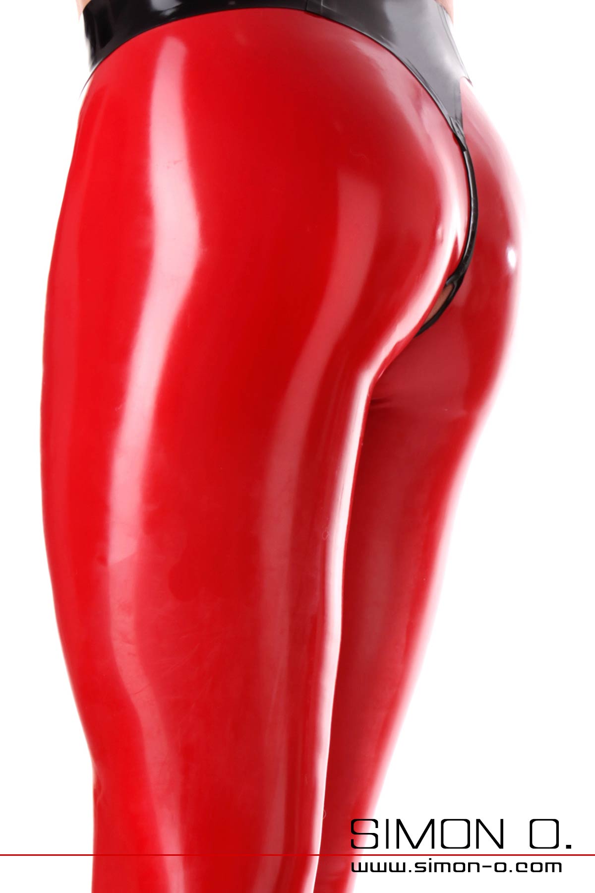 Detail photo red latex leggings with anal opening.