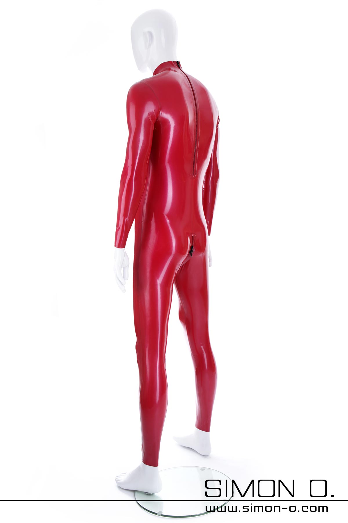 Latex catsuit in red with codpiece and zipper seen from behind