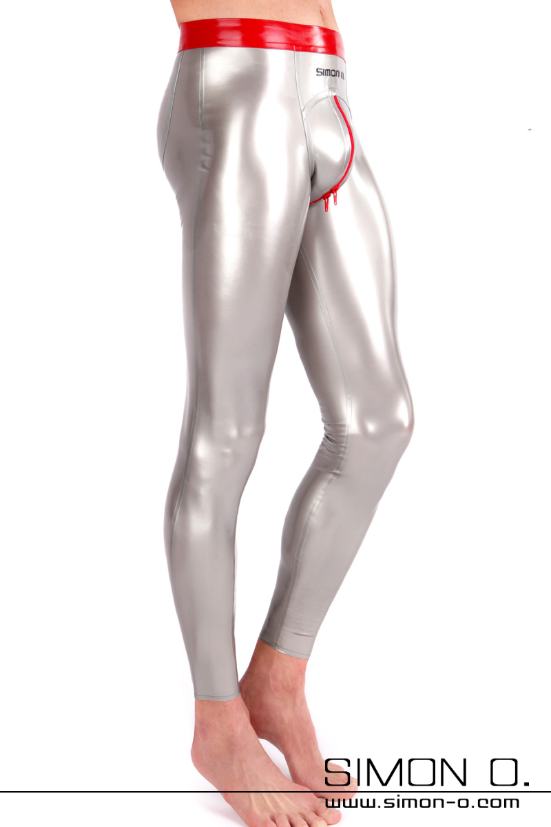 A man wearing tight shiny silver push up latex leggings with a red zipper in the crotch - seen from the front